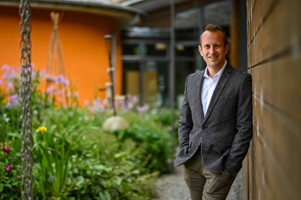 Gareth Griffiths, Ecology CEO in the permaculture gardens at Ecology Building Society